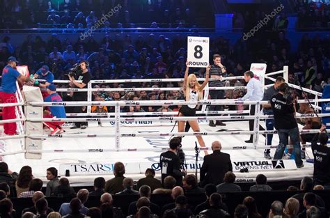 Boxing Ring Girls Holding A Board With Round Number