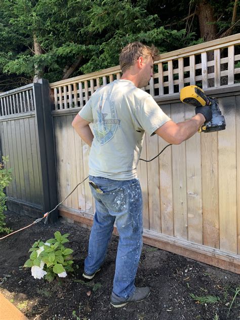 Fences now connect to the solid back sides of stairs. Black Wood Fence Reveal • Black Stain on a Wood Fence in ...