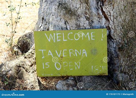 Sign With The Text Welcome Taverna Is Open Stock Photo Image Of