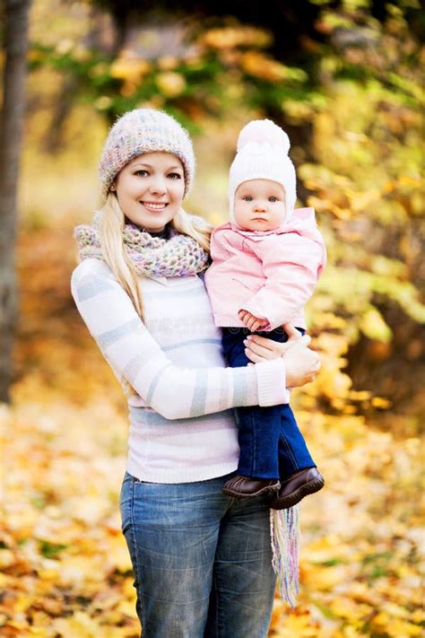 Mother And Baby Outdoor Stock Photo Image Of Embrace 76099542