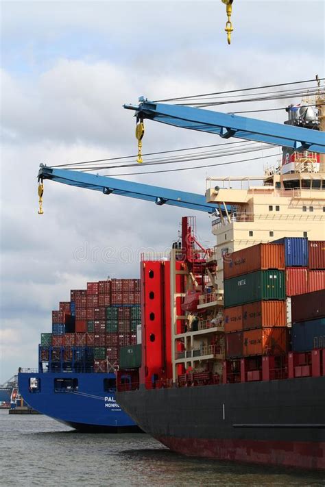 Containers Getting Loaded Or Unloaded From A Ship Stock Image Image