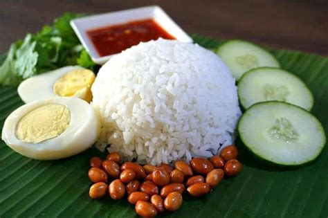 Nasi lemak is a malay fragrant rice dish cooked in coconut milk and pandan leaf. NASI LEMAK - MALAYSIA - Embassy Direct