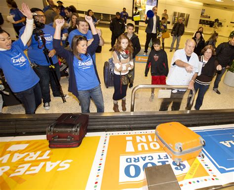Zappos Surprises Flyers At Baggage Claim Event Marketer George Bush