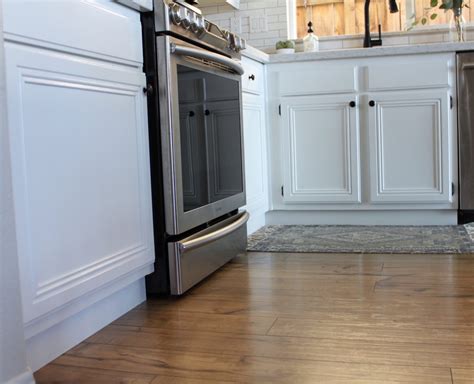 Take the cabinets off the hinges and remove all hardware. DIY Kitchen Update: Cabinet Trim Tutorial | Domestic Blonde