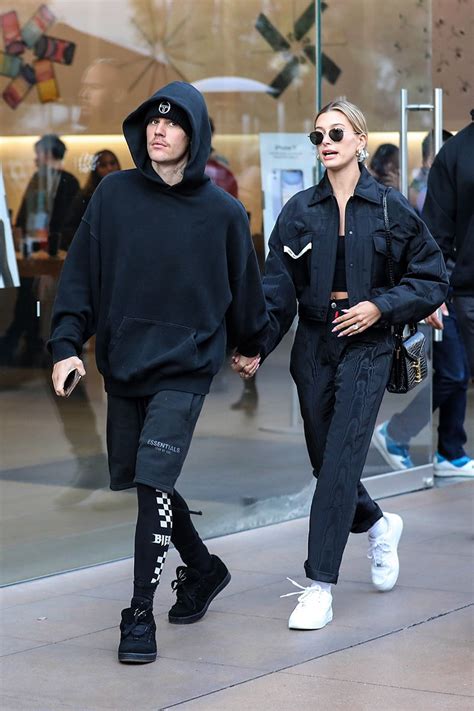 justin and hailey bieber wear matching outfits to shop at the grove sandra rose