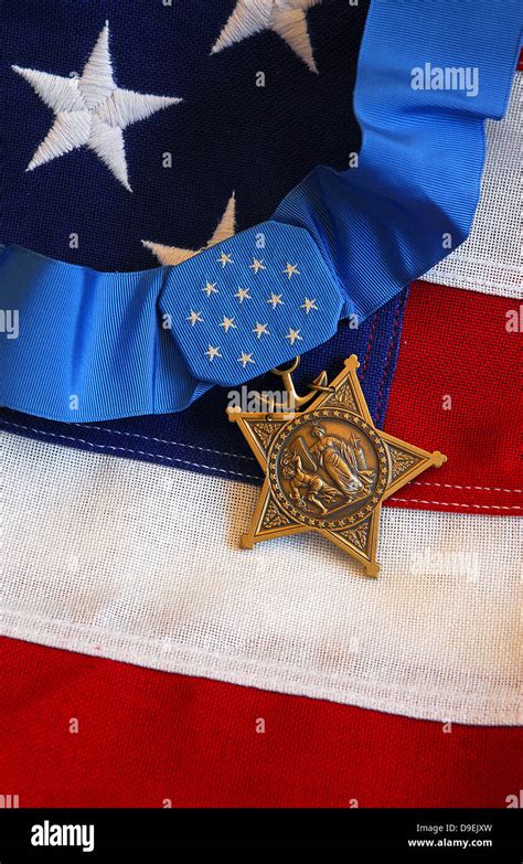 The Medal Of Honor Rests On A Flag During Preparations For An Award