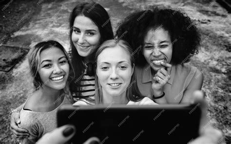 Free Photo Young Adult Female Friends Taking A Group Selfie