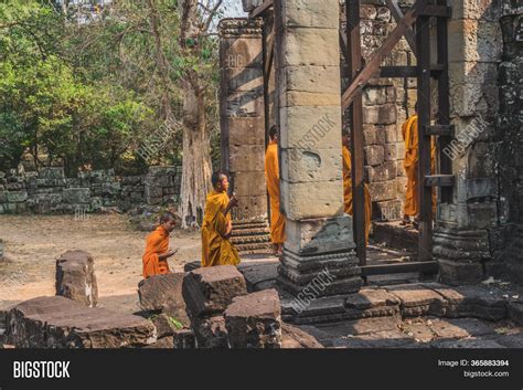 Young Buddhist Monks Image And Photo Free Trial Bigstock