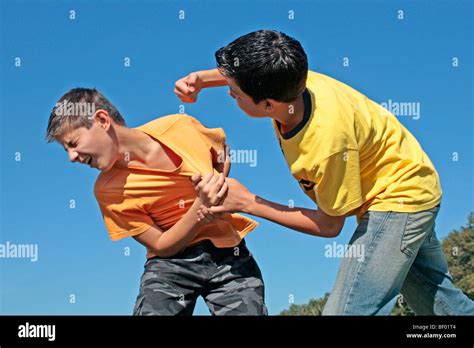 Two Teenage Boys Pretending To Fight Stock Photo Alamy