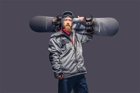 Free Photo Brutal Redhead Snowboarder With A Full Beard In A Winter