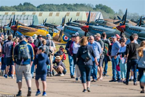 Crowds Enjoy Displays From Spitfires Hurricanes And Lancaster Bombers