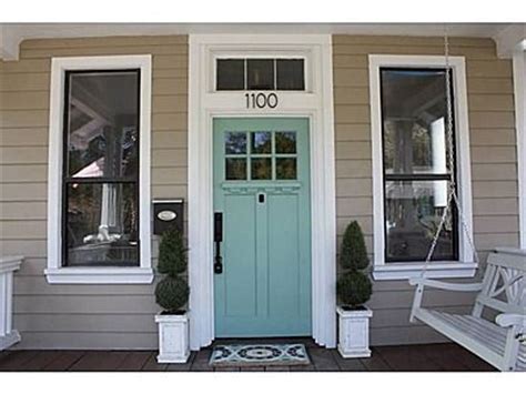 She is using one of our most popular shutters, the standard size four board joined shutters along with these shutter hardware to … aqua front door color with tan siding...just about perfect ...