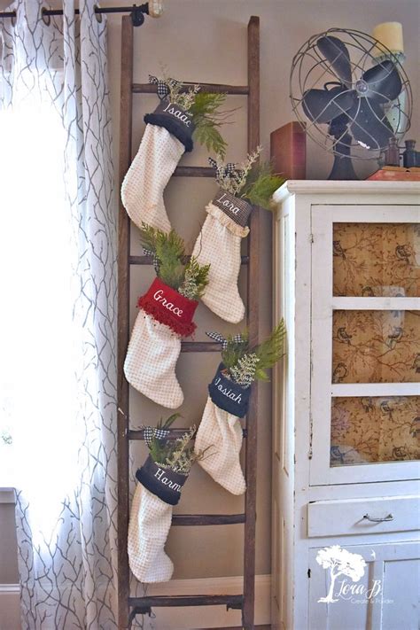 Repurpose An Old Wood Ladder Into A Fun Christmas Stockings Display