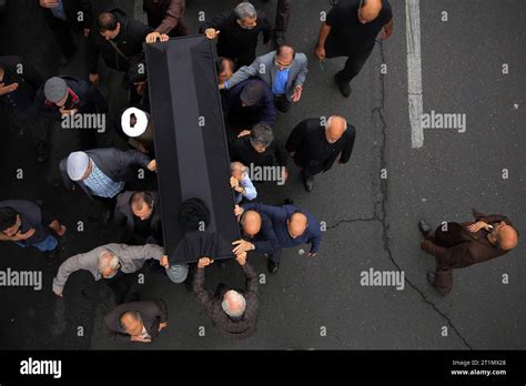 Tehran, Iran. 13th Oct, 2023. Iranian mourners attend a funeral