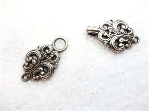 norwegian sweater clasps pewter frogs antiqued silver color