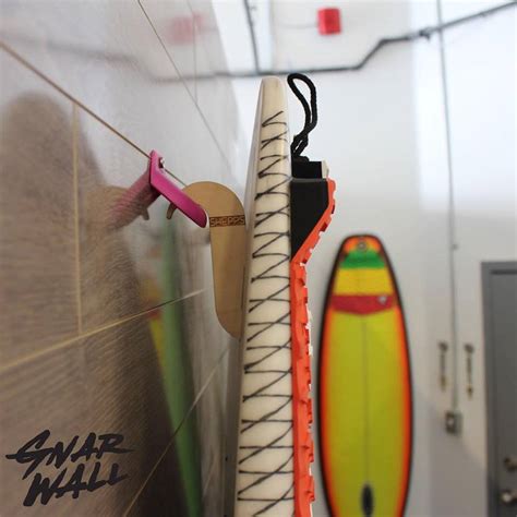 Accrocher votre vélo au mur est un planche de surf électrique pour adulte, planche de surf flottante alimentée à l'eau en eau pour pagaie intelligente pour adultes aidant la natation, le surf. Voici le gadget parfait pour accrocher votre planche de ...