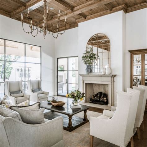 Bright Living Room Features A Wooden Coffered Ceiling With A Hangin In Transitional