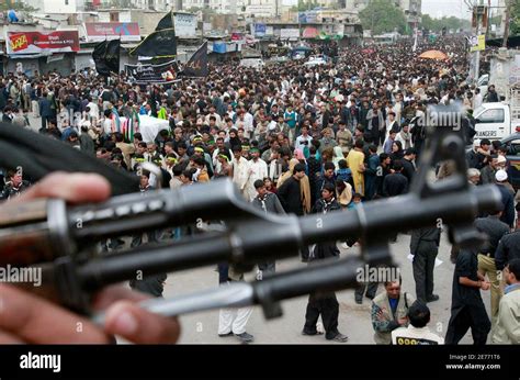 Pakistani Shiites Muslims Take Part In A Religious Procession During