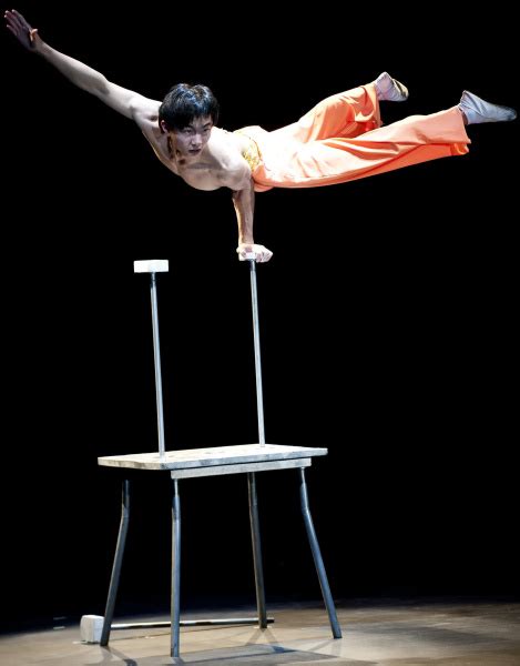 New Shanghai Circus Performs Traditional Chinese Acrobatics Orange