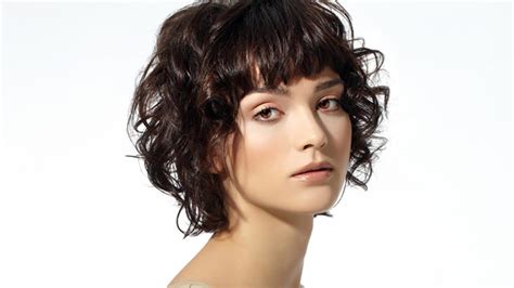 Give your curls a few layers as this will not only reduce their fizziness but will also create style. Top stylish short curly hairstyles for cute girls - Human ...