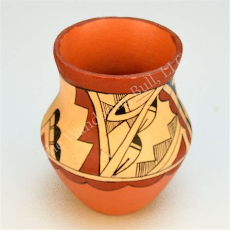 Turning and finishing the vase. Pottery Southwestern 4 inch Vase - The Wandering Bull, LLC
