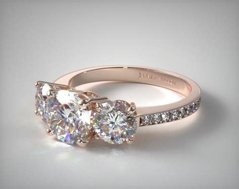 The ring is shown in rose gold. Three Stone Round and Pave Set Diamond Engagement Ring ...
