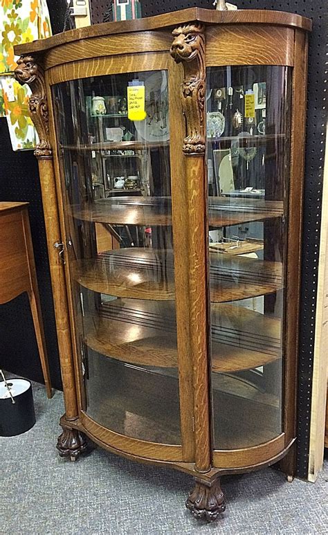 8 Photos Oak Curved Glass Curio Cabinet With Claw Feet And Lions Head