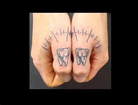 23 Cool Teeth Tattoo Images And Pictures