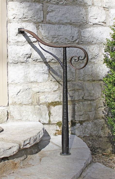 Using iron castings with standard metal pickets really adds a nice pattern to give your home a defined look. Bronze & Steel (exterior) in 2020 | Outdoor stair railing ...