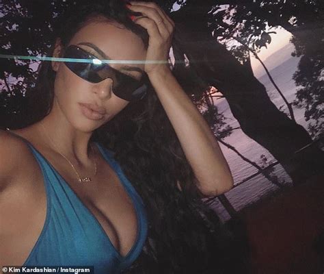Kim Kardashian Shares Sultry Throwback Vacation Photos As She Cleans