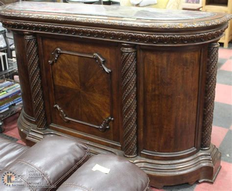 Versital bar tops are ideal for use in many commercial situations. CARVED WOOD BAR WITH MARBLE LIKE TOP