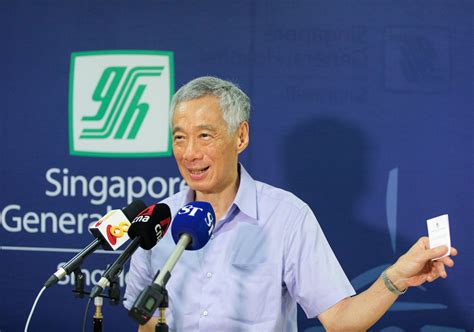 Singapore pledges reopening as mass vaccination speeds up. PM Lee takes Covid-19 vaccine publicly to show ...