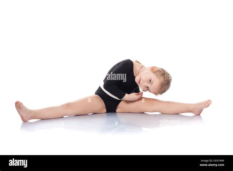Studio Portrait Of Girl Gymnasts Sitting On The Splits Isolation On White Stock Photo Alamy