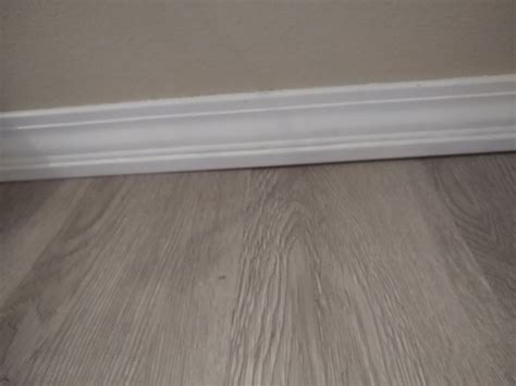 Oakum and methods of using it in applications like this is a very long and well proven history.if.you think rebuilding is out of your skill sets.and.you can live with the gaps. miter joint - Fill baseboard gaps after installing wood vinyl floors - Woodworking Stack Exchange