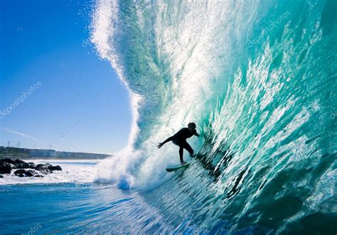 Surfer On Blue Ocean Wave Stock Photo By ©epicstockmedia 8450830