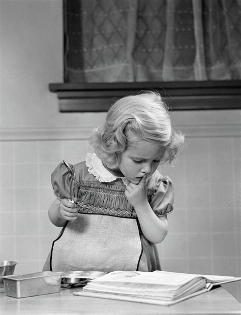 Two russian babysitters playing with pussies. 1940s Little Girl Playing In Kitchen Photograph by Vintage ...