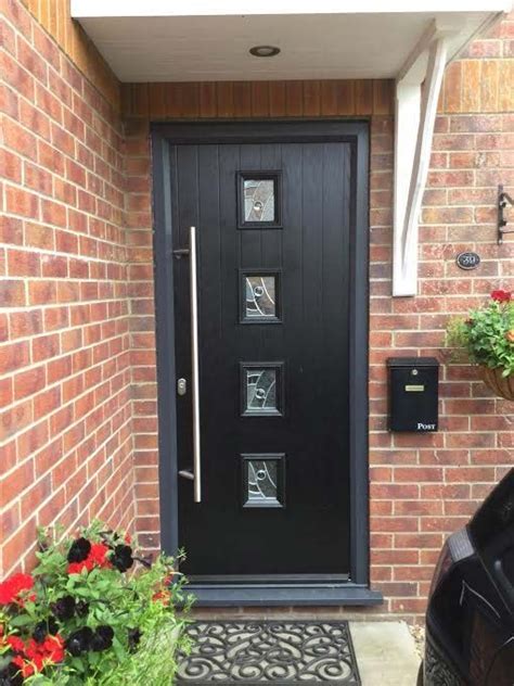 Choose from an excellent selection of black. 4 square style composite door in black with grey frame and ...
