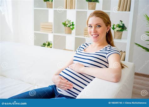 Pregnant Woman Sitting On A Couch Stock Image Image Of Person Mother 98089745