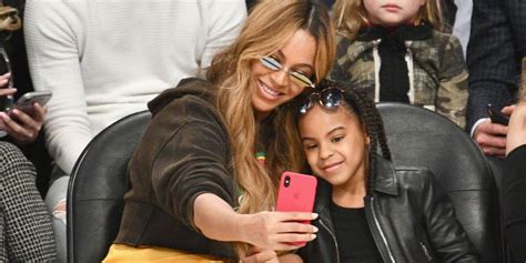 Little sir is sitting on his dad's lap and wearing a matching tuxedo, while beyonce, blue ivy and rumi look. Beyonce Twins Pictures Now