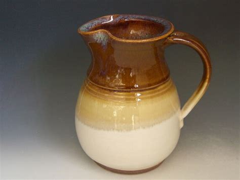 hand thrown stoneware pottery pitcher by guccionepottery on etsy