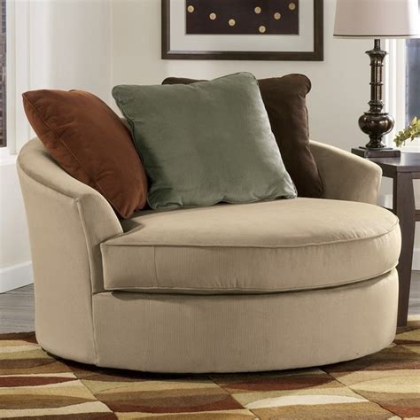 The cambri oversized round swivel chair, made by ashley furniture, is brought to you by furniture and appliancemart. Signature Design by Ashley 7070421 Laken Oversize Round ...