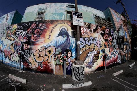 One of l.a.'s most striking murals is artist kent twitchell's bride and groom.. Chicano Mural Art: A Look Into Los Angeles Art Culture ...
