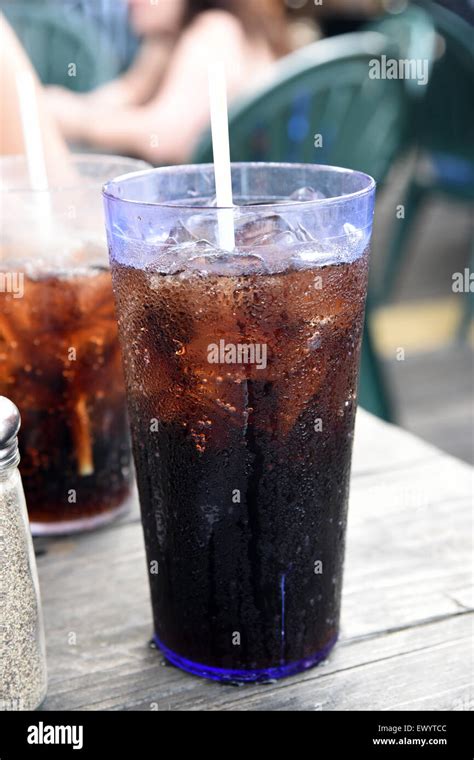 Cup Of Soda With Ice And Straw Stock Photo Alamy