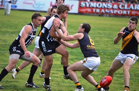 The club adopted a circular upon entering the afl in 1997 port adelaide adopted the power moniker, which included taking on the club's current logo. Glenelg Tigers v Port Adelaide Magpies SANFL July 2011 Alb ...