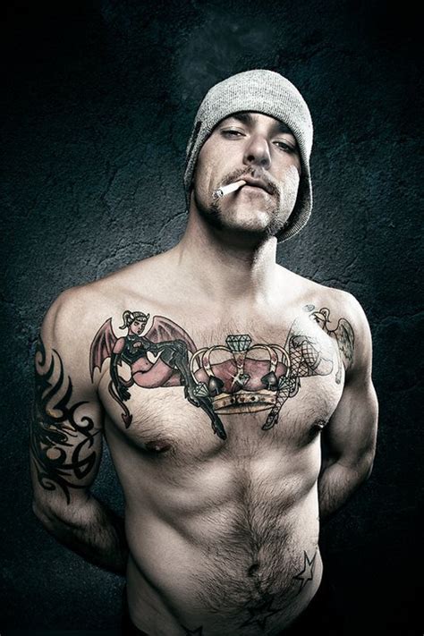 For a dramatic touch, the tattoo artist uses a black shading technique to give some depth to the tattoo. Country Tattoos for Men