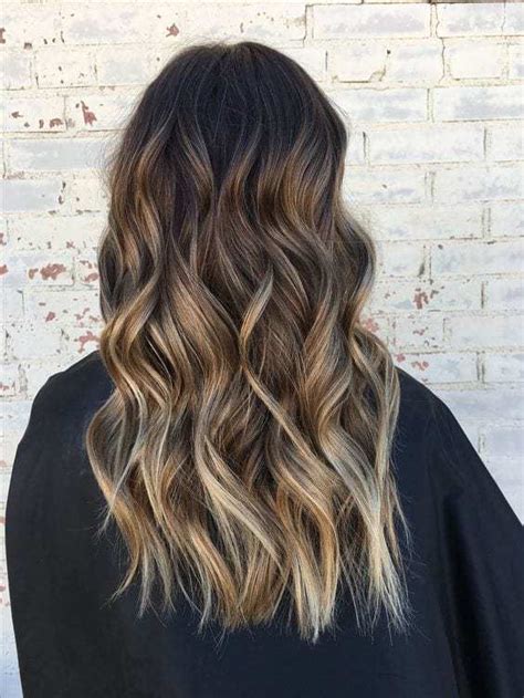 Wavy brunette with chunky sunflower blonde highlights. 50 Fashionable Ideas for Brown Hair with Blonde Highlights ...