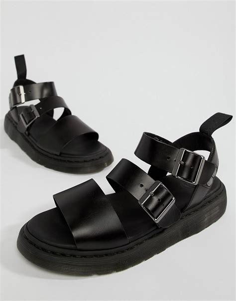 Stomp your way through summer in a pair of docs sandals. Lyst - Dr. Martens Gryphon Sandals in Black for Men