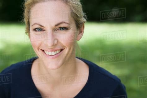 Close Up Of Womans Smiling Face Stock Photo Dissolve