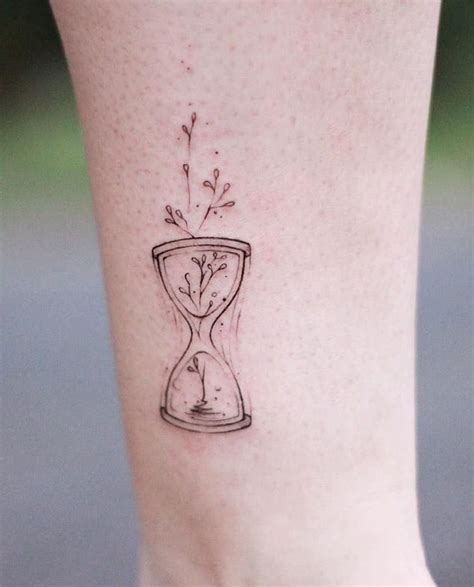 Hourglass Tattoos Meanings Tattoo Designs And Ideas