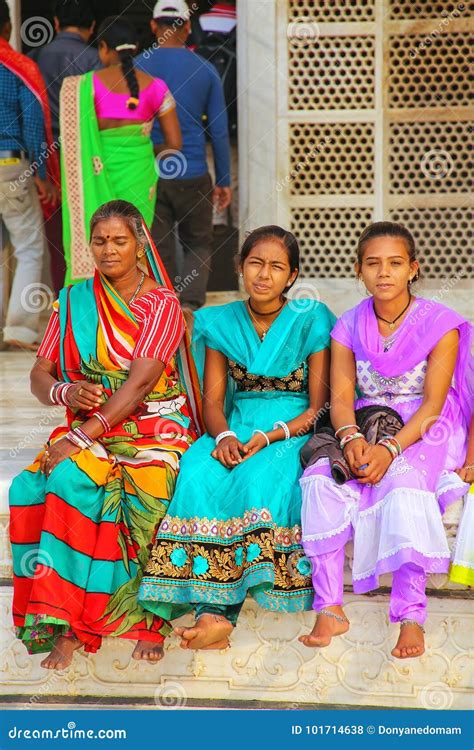 Women In Colorful Saris Sitting Outside Taj Mahal In Agra Uttar